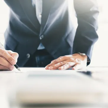 A person signing a document
